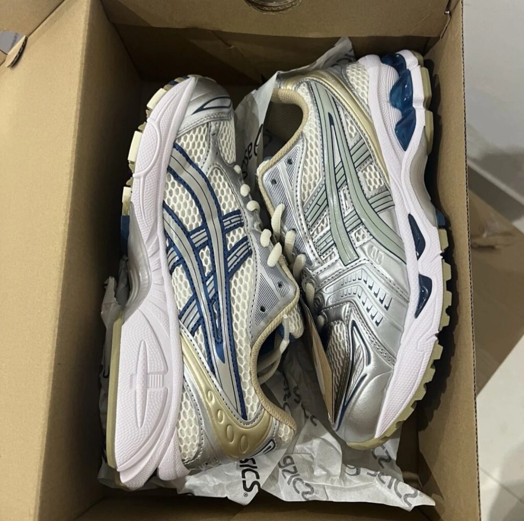 White, blue, silver and gold trainers